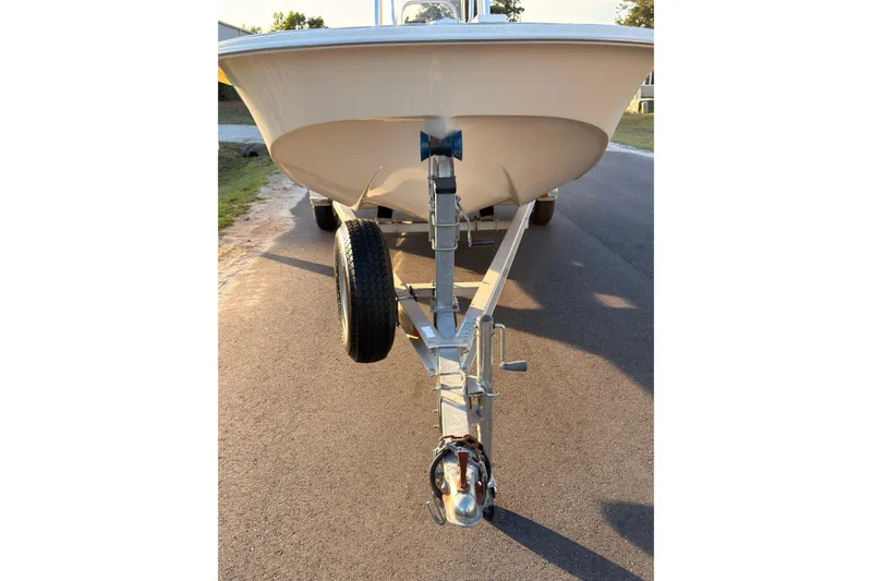 Slide: The Image of 2013 Carolina Skiff 198 DLV boat on trailer, viewed from the front. - 26