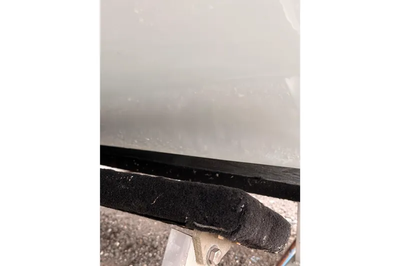 Slide: The Image of Close-up of 2013 Carolina Skiff 198 DLV hull on trailer support. - 30