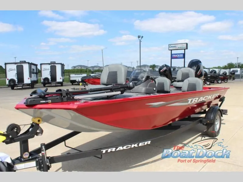 Slide: The Image of Red Pro Team 170 boat, 2026 model, on trailer outdoors. - 5
