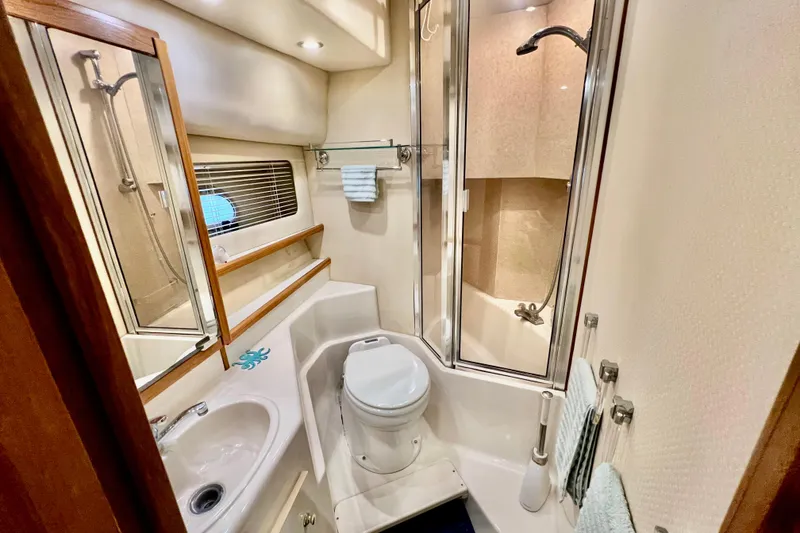 Slide: The Image of Luxurious bathroom in 2001 Bayliner 4788 Pilot House Motoryacht with shower and toilet. - 21