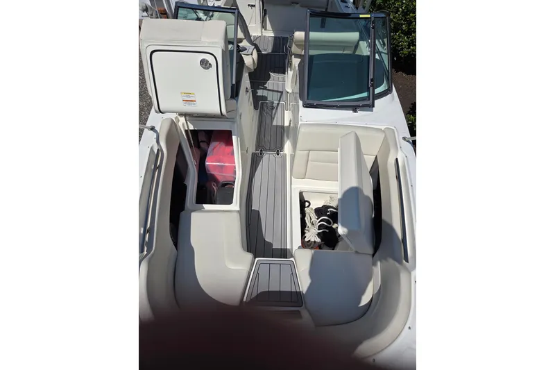 Slide: The Image of 2018 Boston Whaler 230 Vantage boat interior with seating and storage compartments. - 15
