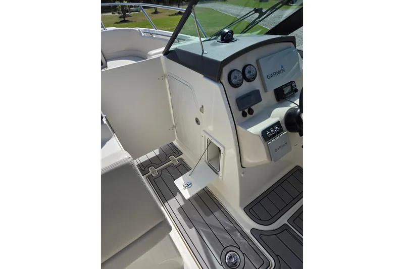 Slide: The Image of 2018 Boston Whaler 230 Vantage boat cockpit with Garmin navigation system. - 25