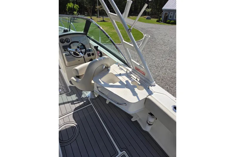 Slide: The Image of 2018 Boston Whaler 230 Vantage boat interior with steering wheel and seating. - 5