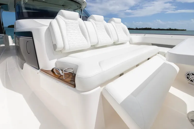 Slide: The Image of Manufacturer Provided Image: Luxurious seating on 2026 Tiara Yachts 46 LS, featuring sleek white upholstery and modern design. - 11