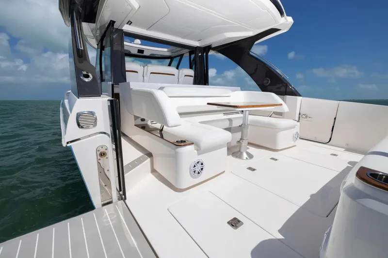 Slide: The Image of Manufacturer Provided Image: Luxurious 2026 Tiara Yachts 46 LS with sleek seating and ocean view. - 12