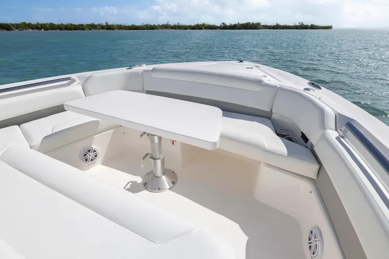 Slide: The Image of Manufacturer Provided Image: Luxurious seating area on 2026 Tiara Yachts 46 LS, overlooking serene waters. - 7