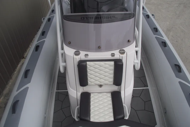 Slide: The Image of 2024 Highfield Sport 760 boat interior with quilted seating and modern design. - 10