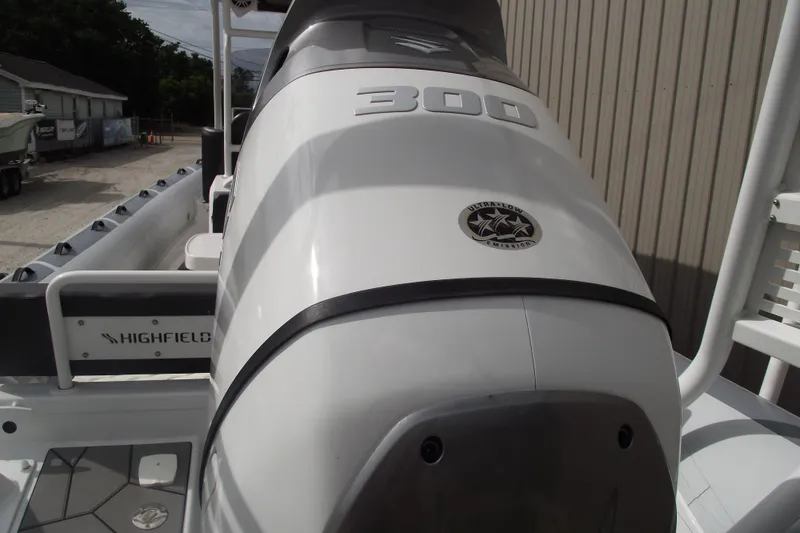Slide: The Image of 2024 Highfield Sport 760 boat engine with ultra-low emission label. - 4