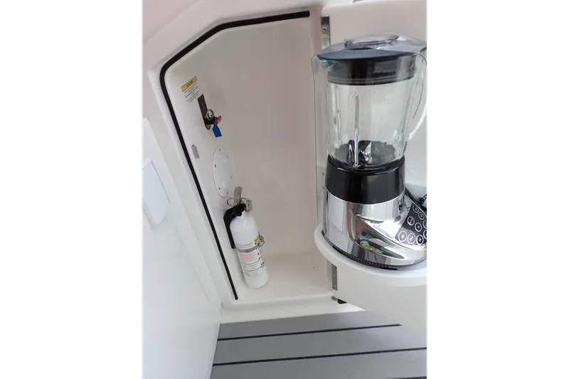Slide: The Image of Blender and fire extinguisher on 2024 Formula 400 Super Sport Crossover boat. - 11