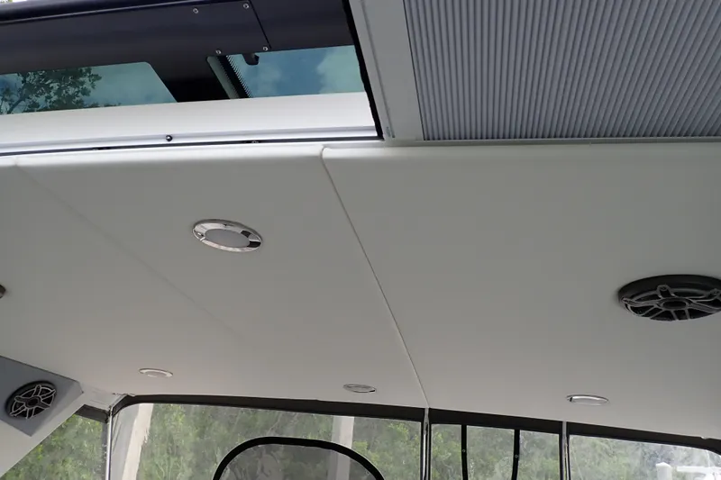 Slide: The Image of 2024 Formula 400 Super Sport Crossover interior ceiling with speakers and lighting. - 19