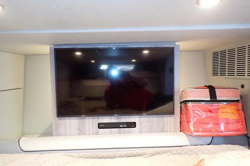 Slide: The Image of Interior of 2024 Formula 400 Super Sport Crossover with TV and storage bag. - 33