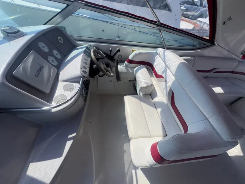 Slide: The Image of Interior of a 2001 Formula 37 SUPER SPORT boat with helm console. - 11