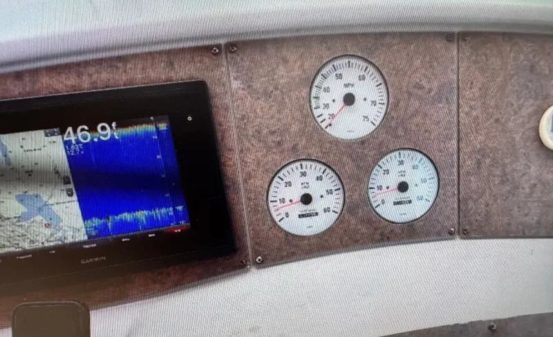 Slide: The Image of Dashboard of a 2001 Formula 37 SUPER SPORT boat with Garmin display. - 13