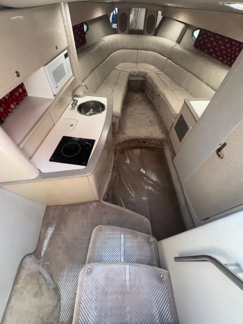 Slide: The Image of Interior of a 2001 Formula 37 SUPER SPORT yacht with kitchen and seating area. - 14
