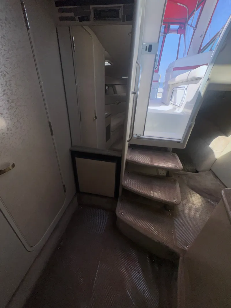 Slide: The Image of Interior of 2001 Formula 37 SUPER SPORT yacht with stairs and storage. - 19