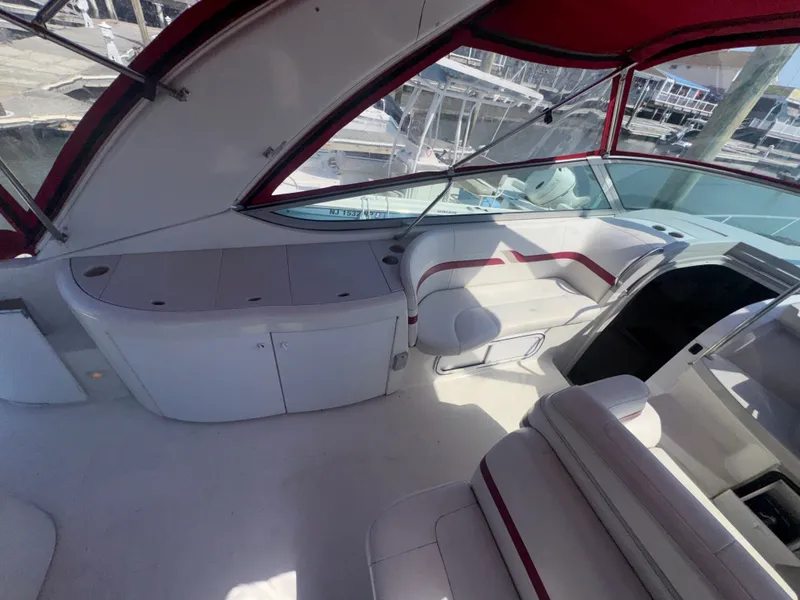 Slide: The Image of Interior of a 2001 Formula 37 SUPER SPORT yacht with red accents. - 9