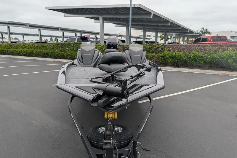 Slide: The Image of 2026 Tracker Pro Team 195 TXW boat on trailer in parking lot. - 4