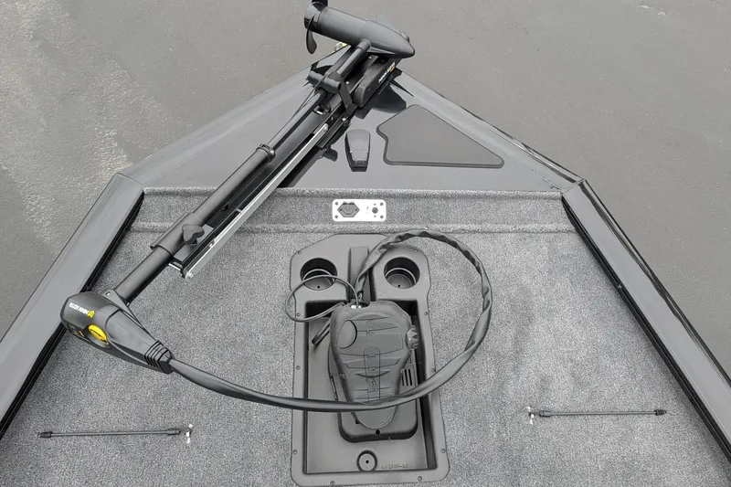 Slide: The Image of 2026 Tracker Pro Team 195 TXW boat deck with trolling motor and foot pedal controls. - 9