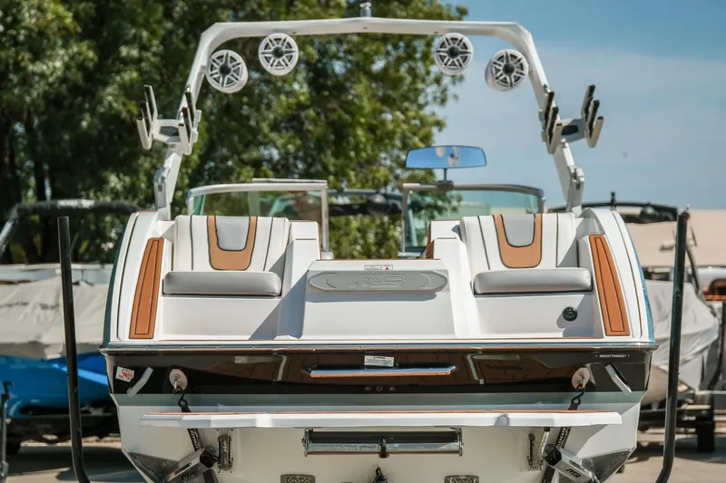Slide: The Image of 2021 MB F24 Tomcat boat with sleek design and modern features, rear view. - 9