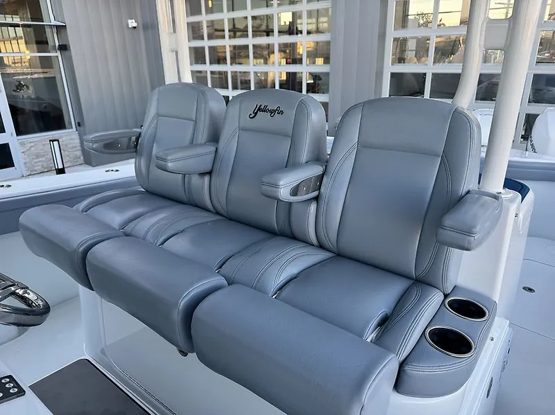 Slide: The Image of 2022 Yellowfin 42 Offshore gray leather seats with armrests. - 10