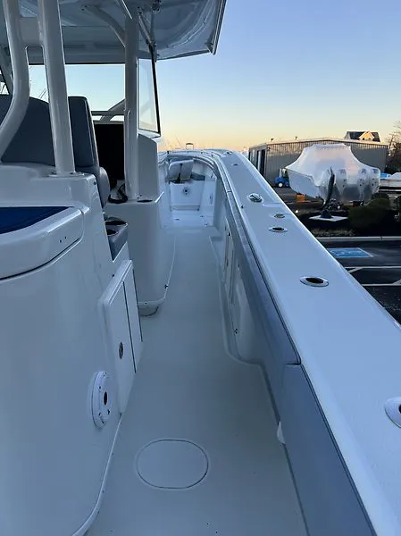 Slide: The Image of Interior view of a 2022 Yellowfin 42 Offshore boat at sunset. - 15