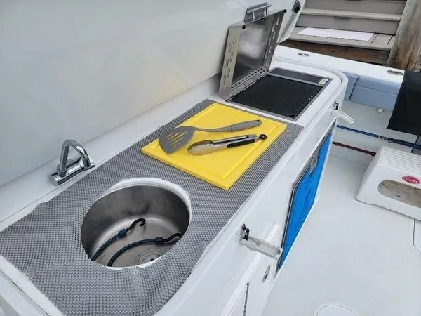 Slide: The Image of Kitchen area on Yellowfin 42 Offshore boat, 2022 model. - 21