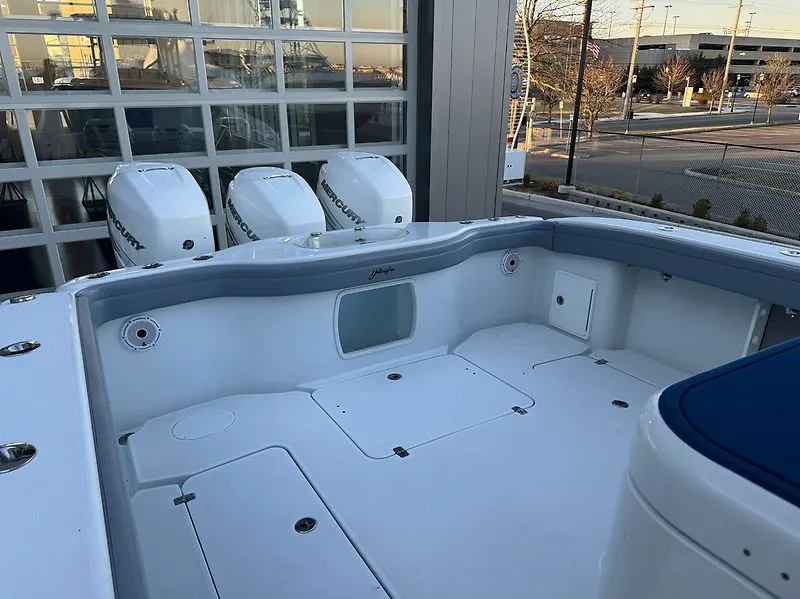 Slide: The Image of 2022 Yellowfin 42 Offshore boat with Mercury engines at dock. - 22