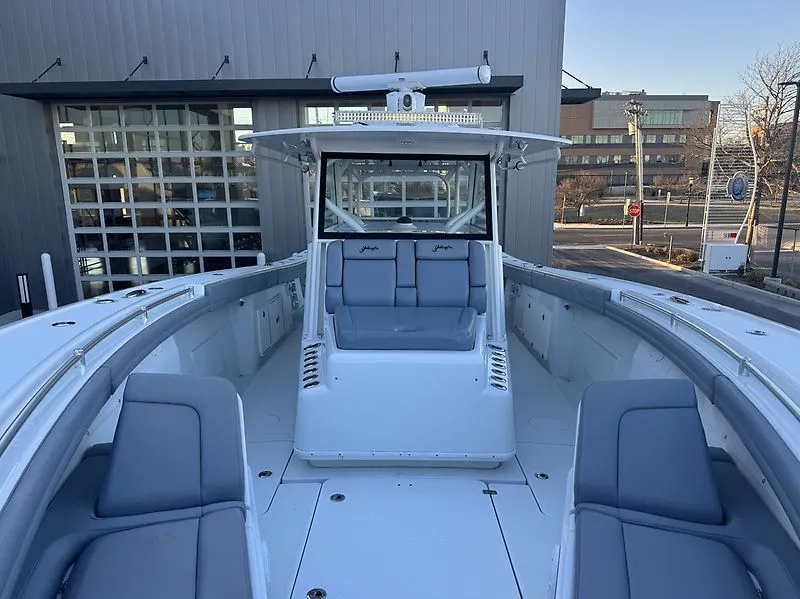 Slide: The Image of 2022 Yellowfin 42 Offshore boat with gray seating at the dock. - 5
