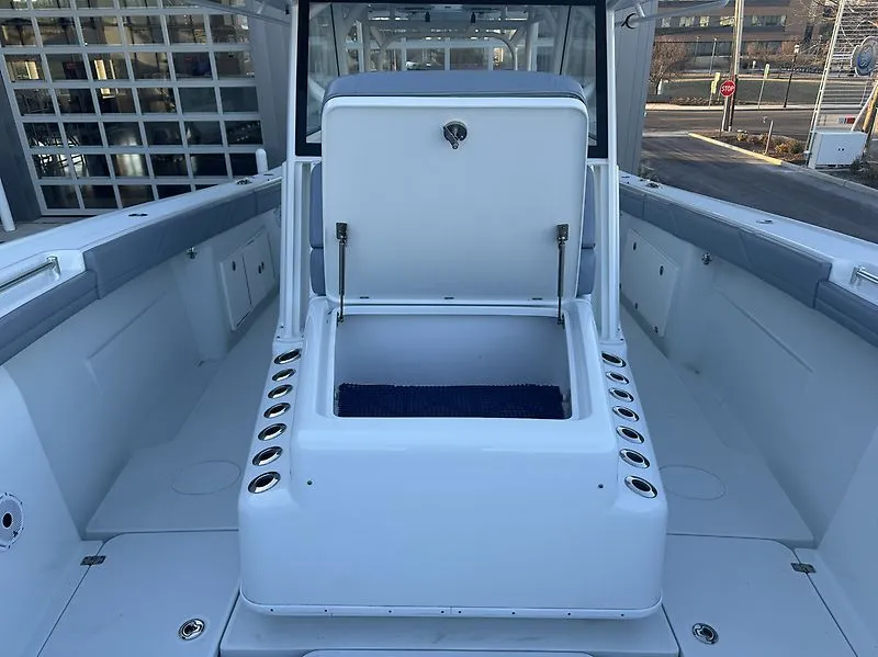 Slide: The Image of Interior view of 2022 Yellowfin 42 Offshore with open storage compartment. - 6