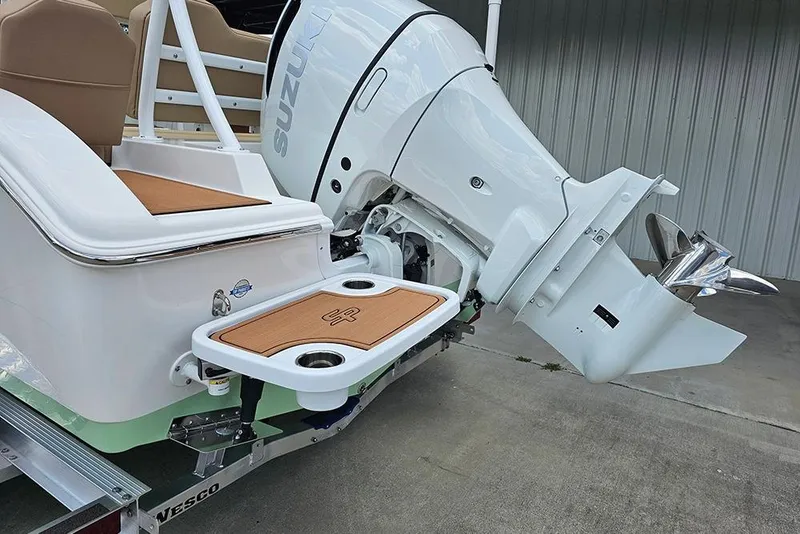 Slide: The Image of 2026 Sea Pro 225FLX Sandbar boat with Suzuki outboard motor and swim platform. - 10