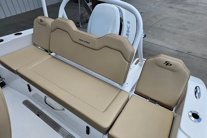 Slide: The Image of 2026 Sea Pro 225FLX Sandbar boat seating with beige upholstery and sleek design. - 11