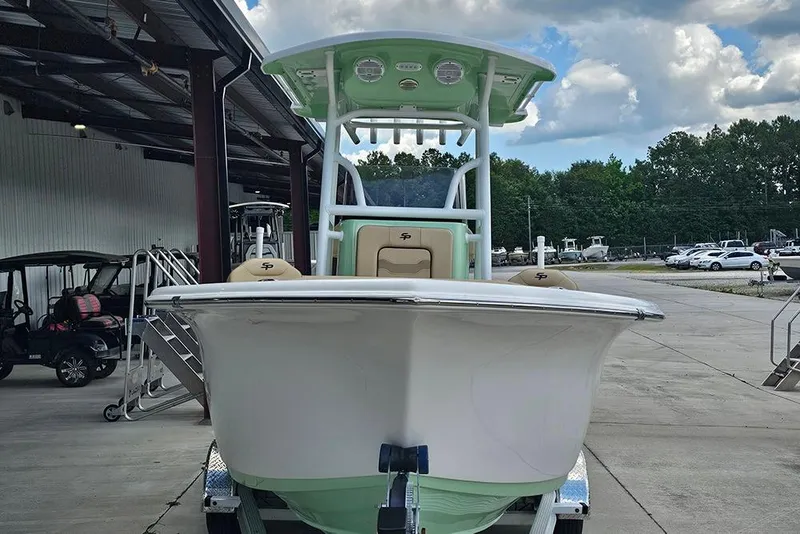 Slide: The Image of 2026 Sea Pro 225FLX Sandbar boat docked outdoors under a cloudy sky. - 5