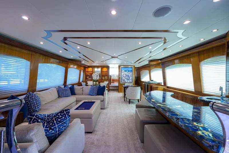Slide: The Image of Luxurious interior of 2007 Hatteras 80 Motor Yacht with elegant seating and stylish decor. - 14
