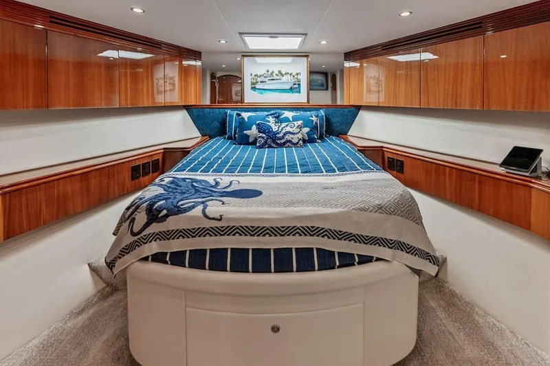 Slide: The Image of Luxurious bedroom interior of 2007 Hatteras 80 Motor Yacht with nautical decor. - 32
