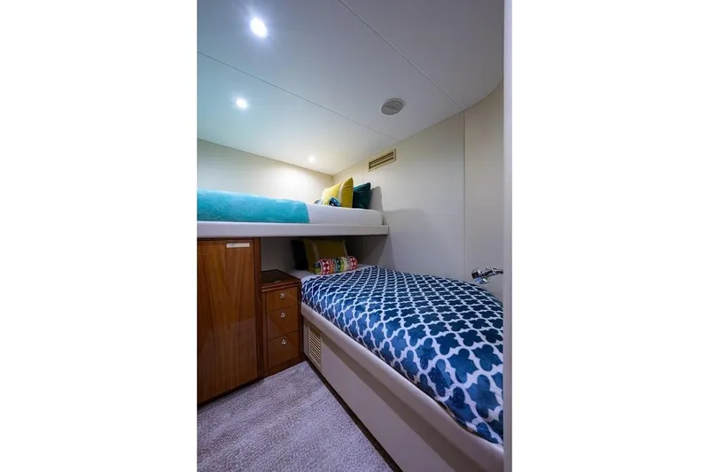 Slide: The Image of Cozy bunk beds in 2007 Hatteras 80 Motor Yacht cabin with modern lighting. - 28