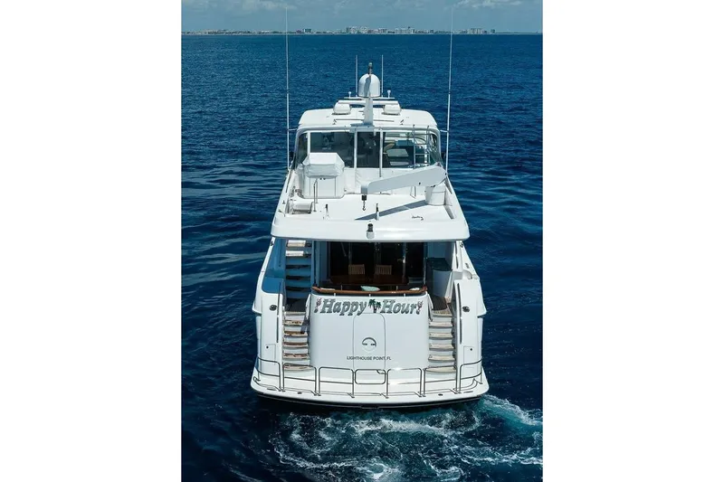 Slide: The Image of 2007 Hatteras 80 Motor Yacht cruising on open blue sea. - 3