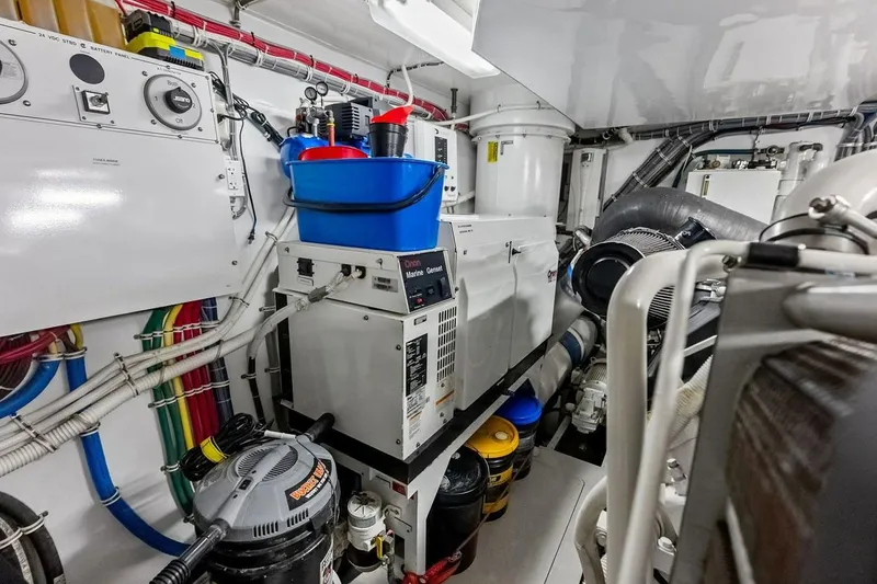 Slide: The Image of Engine room of 2007 Hatteras 80 Motor Yacht with generator and maintenance equipment. - 57