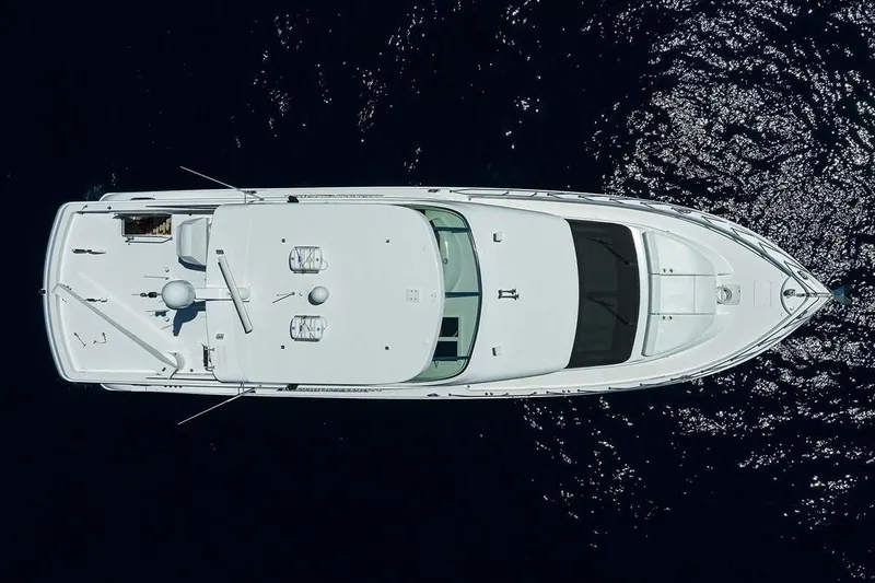 Slide: The Image of Aerial view of 2007 Hatteras 80 Motor Yacht on dark water. - 4