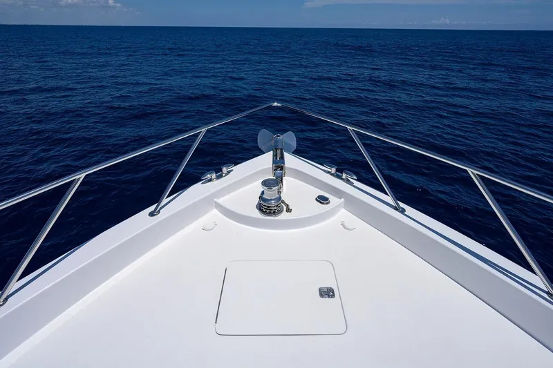 Slide: The Image of Bow of 2007 Hatteras 80 Motor Yacht cruising on open sea. - 5