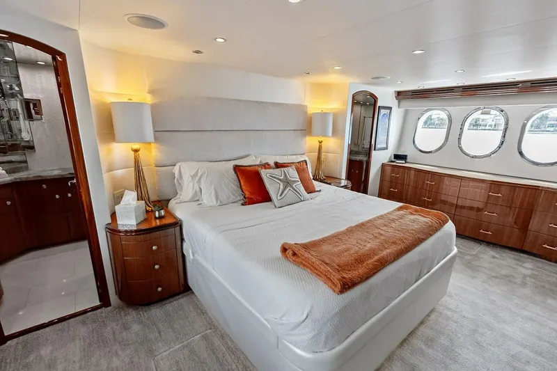 Slide: The Image of Luxurious bedroom interior of 2007 Hatteras 80 Motor Yacht with elegant furnishings. - 22