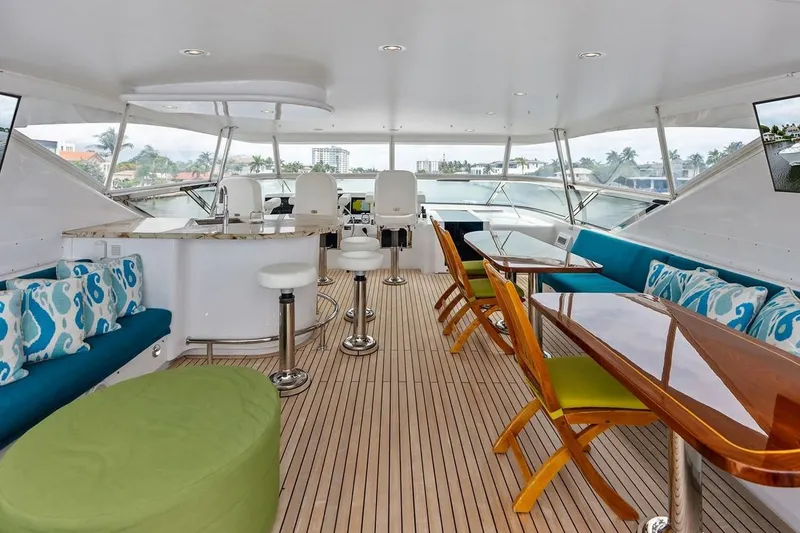 Slide: The Image of Luxurious 2007 Hatteras 80 Motor Yacht interior with elegant seating and modern design. - 37