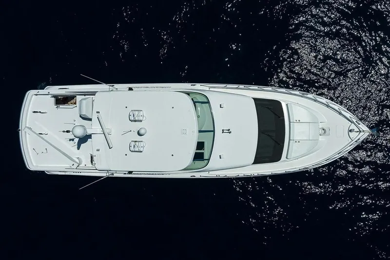 Slide: The Image of Aerial view of 2007 Hatteras 80 Motor Yacht on dark water. - 4