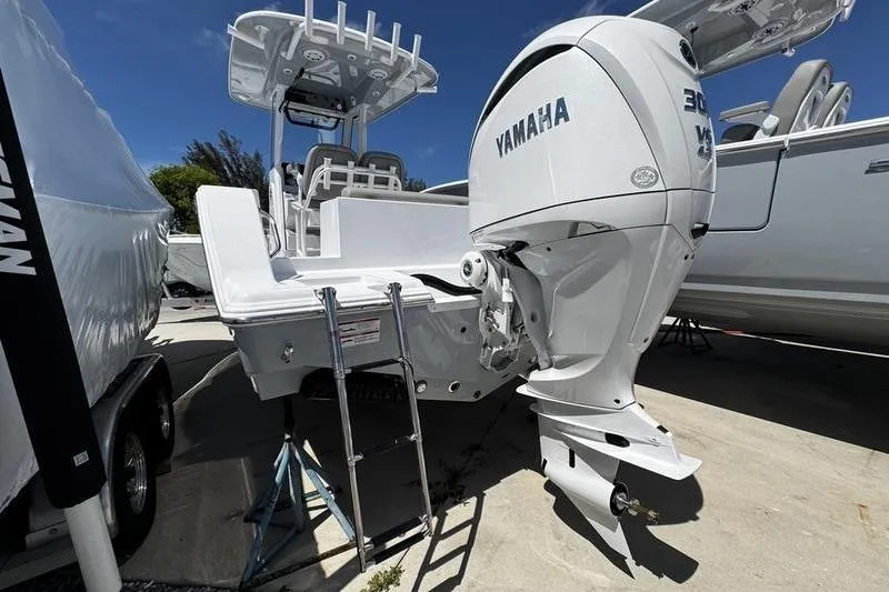 Slide: The Image of 2026 Sportsman Open 232 Center Console boat with Yamaha 300 HP engine. - 24