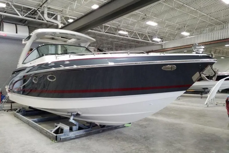 The Image of 2020 Formula 330 Crossover Bowrider in a showroom, showcasing sleek design and modern features. - 0