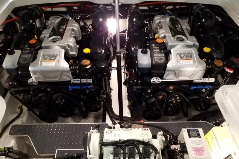 Slide: The Image of Twin V8 engines in a 2020 Formula 330 Crossover Bowrider boat engine compartment. - 19