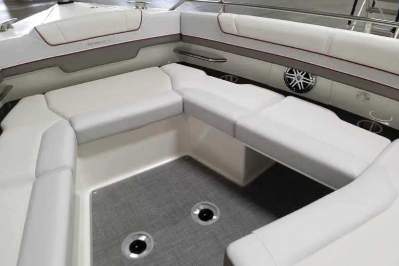 Slide: The Image of 2020 Formula 330 Crossover Bowrider interior with white cushioned seating and modern design. - 6