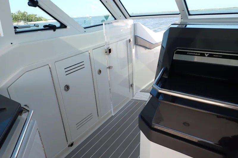 Slide: The Image of 2022 Formula 400 Super Sport Crossover interior with sleek design and modern features. - 12