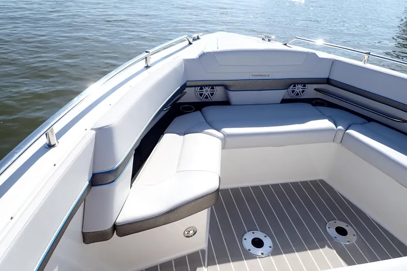 Slide: The Image of 2022 Formula 400 Super Sport Crossover boat interior with luxurious seating and sleek design. - 15