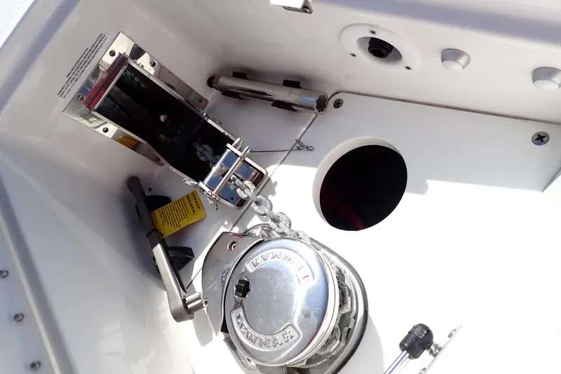 Slide: The Image of Anchor compartment of 2022 Formula 400 Super Sport Crossover boat, featuring Lewmar windlass. - 18