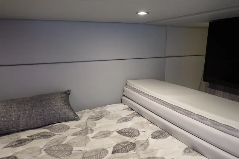 Slide: The Image of Interior cabin of 2022 Formula 400 Super Sport Crossover with bed and modern decor. - 19